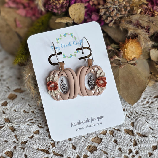 Floral pumpkins in muted rust tones