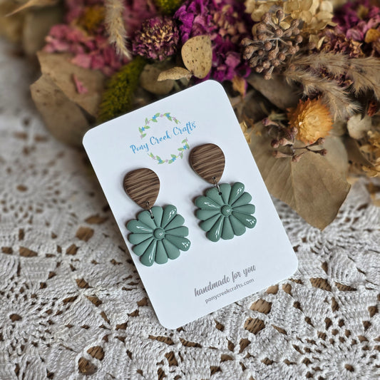 Embossed statement piece in muted blue/green with faux wood findings