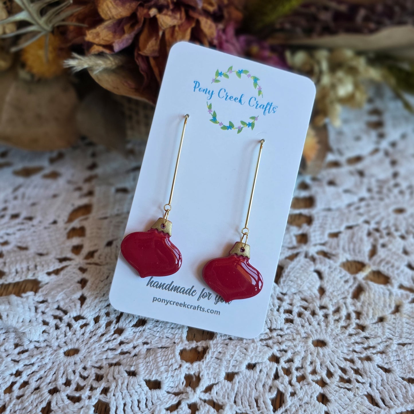 Shiny red and gold accent ornament earrings