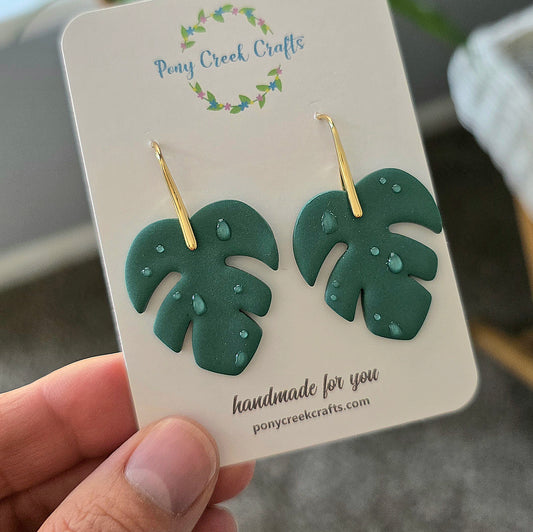 Monster leaf with water droplets earrings