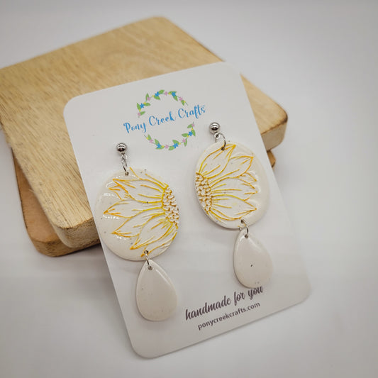 Embossed sunflower statement earrings