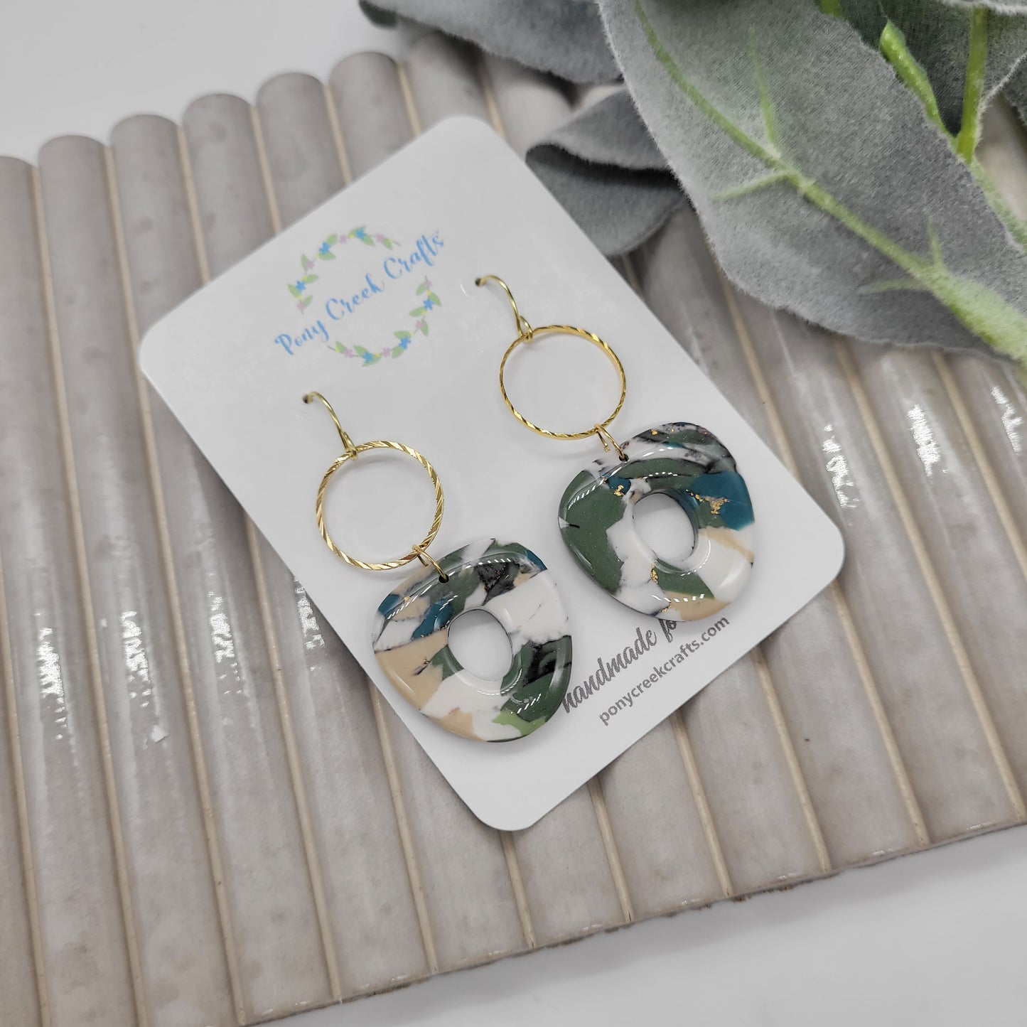 Blue-green statement earrings