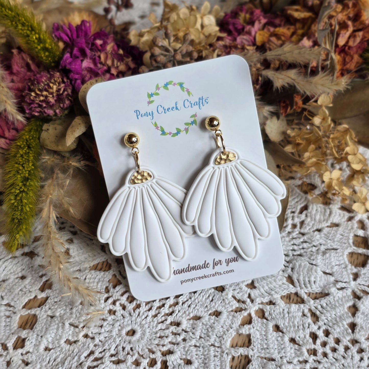 Soft white and gold accent floral statement piece