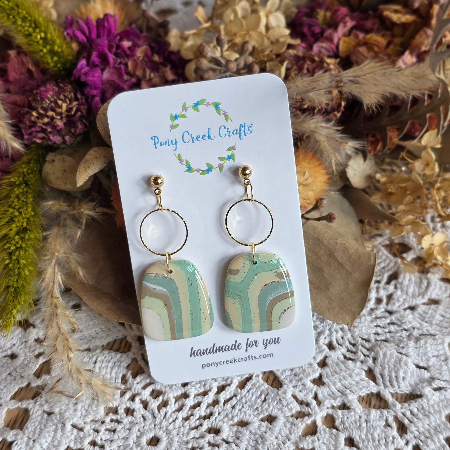 Faux agate in earth tones with gold accent connector and ball post findings