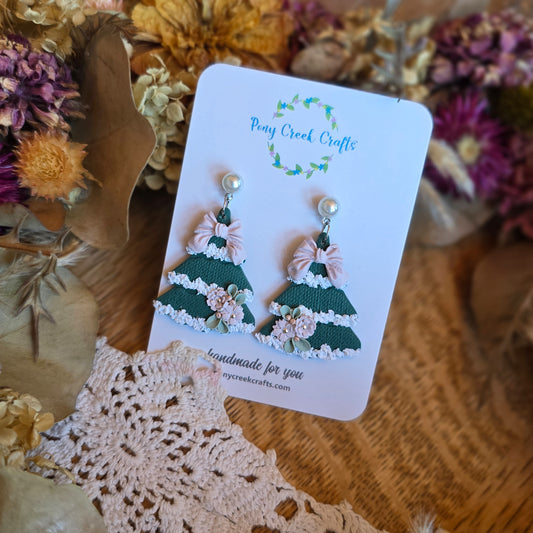 Country inspired Christmas tree earrings in green with pink bow and floral accents