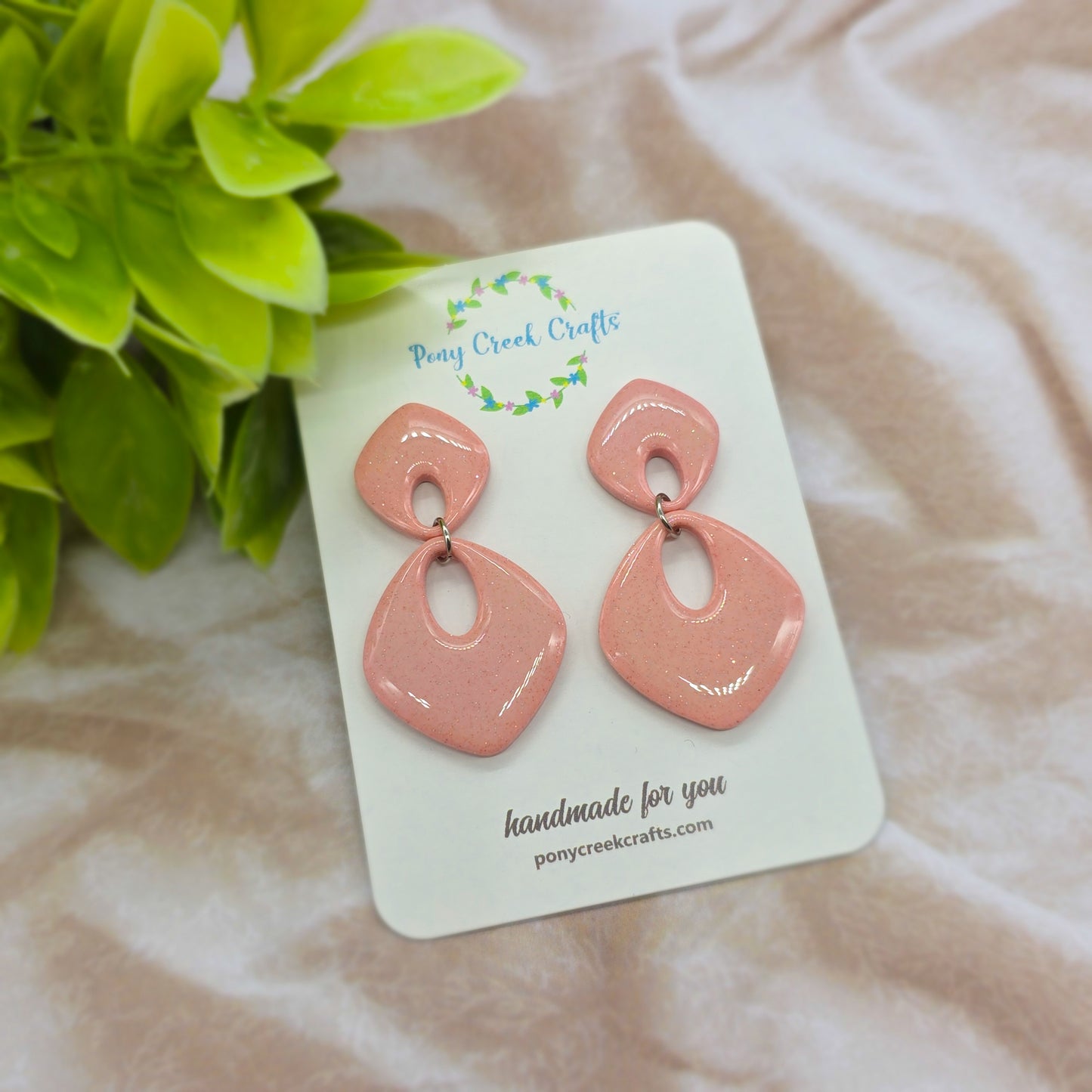 Shimmering pink statement earrings
