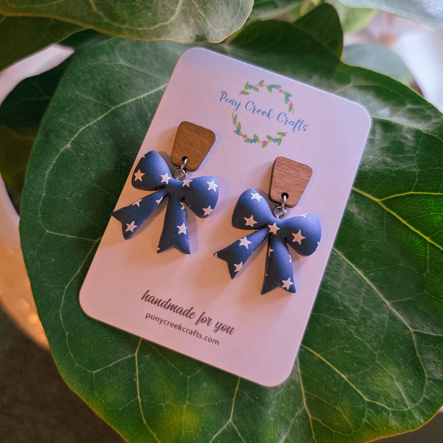 Navy and star print bow earrings